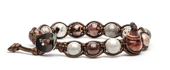 Bracciale originale tibetano Tamashii realizzato con pietre naturali ARCTIC JASPER.  Misura pietre: 8mm. Unisex e taglia unica (il bracciale è predisposto per adattarsi a qualsiasi diametro di polso).  Ogni bracciale è spedito con relativa confezione originale e certificato di garanzia