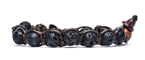 Bracciale originale tibetano Tamashii realizzato con LAVA NERA NATURALE. Misura pietre: 8mm. Unisex e taglia unica (il bracciale è predisposto per adattarsi a qualsiasi diametro di polso).  Ogni bracciale è spedito con relativa confezione originale e certificato di garanzia.