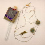 Collana Archè. Storie di Monili referenza: A.1/1 Lunghezza: 100 centimetri  Materiali: Perle di fiume, Argento 925, Ambra, Agata
